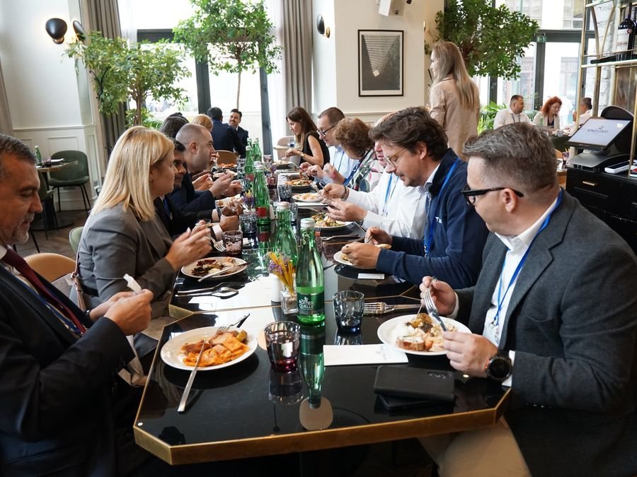 Delegates at a long lunch table in the restaurant at Hotel KINGS COURT, Prague, 2026 edition of the Global Future of BPO, Shared Services & GBS Conference