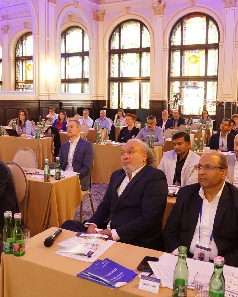 Senior delegates following a keynote in the stained-glass main hall at the 2026 edition of the Global Future of BPO, Shared Services & GBS Conference